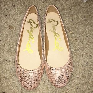 Rose gold snakeskin flats